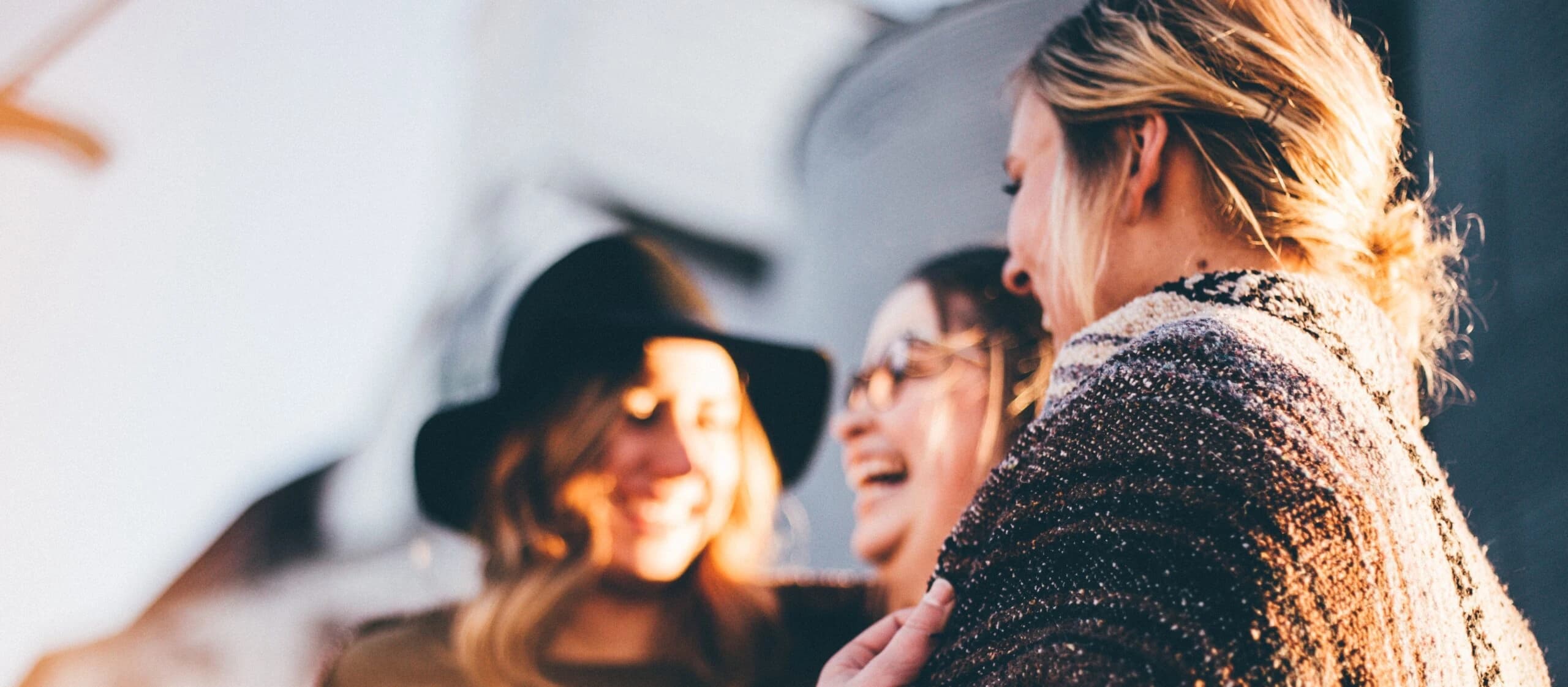 group of friends laughing representing treatment for depression stages