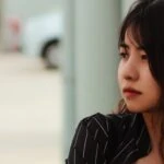 woman looking off representing schizophrenia symptoms.