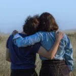 two people hug depicting what is dyspraxia